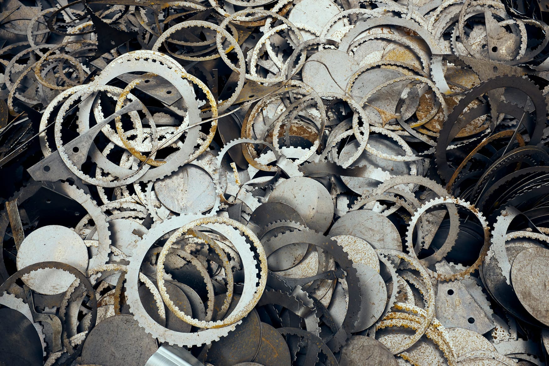 Rusting cogwheels out of sync — the broken corporate machine.